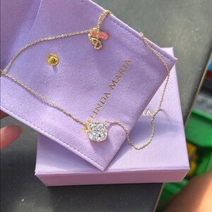 Melinda Maria Gold and White Necklace with Elegant Pendant